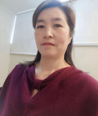 Book an Appointment with Guohong Huang for Massage Therapy